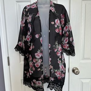 Maurice’s black kimono with pink flowers and trimmed in lace! Size XS.